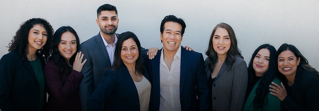 The eight people of the firm, photographed together